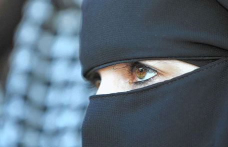 veiled woman