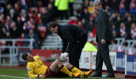 Arsenal Manager Arsene Wenger watches closley as Jack Wilshere