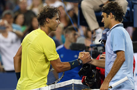 Rafael Nadal of Spain shakes hands with Roger Federer