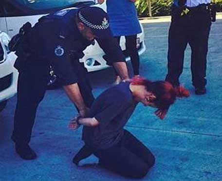 British singer Lily Allen hand-cuffed.