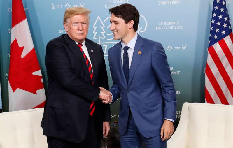 Donald Trump shakes hands with Canada Prime Minister Justin Trudeau