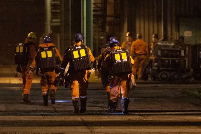 Rescue personnel prepare to search for missing miners after a methane explosion