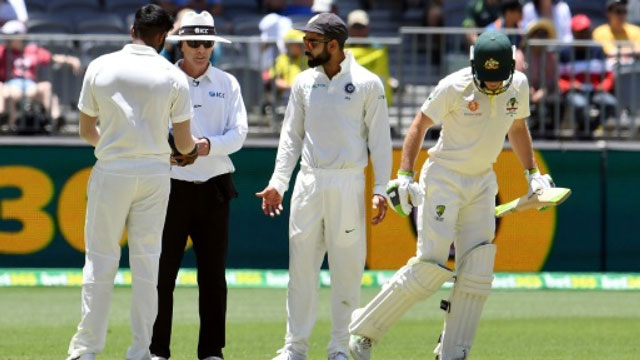 Tim Paine and Virat Kohli