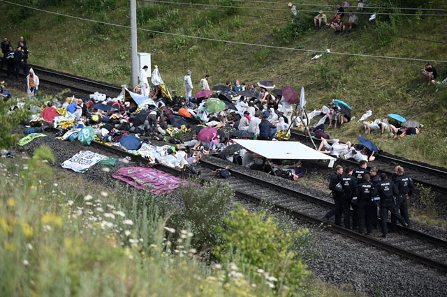Hundreds of climate activists occupy giant German coal mine