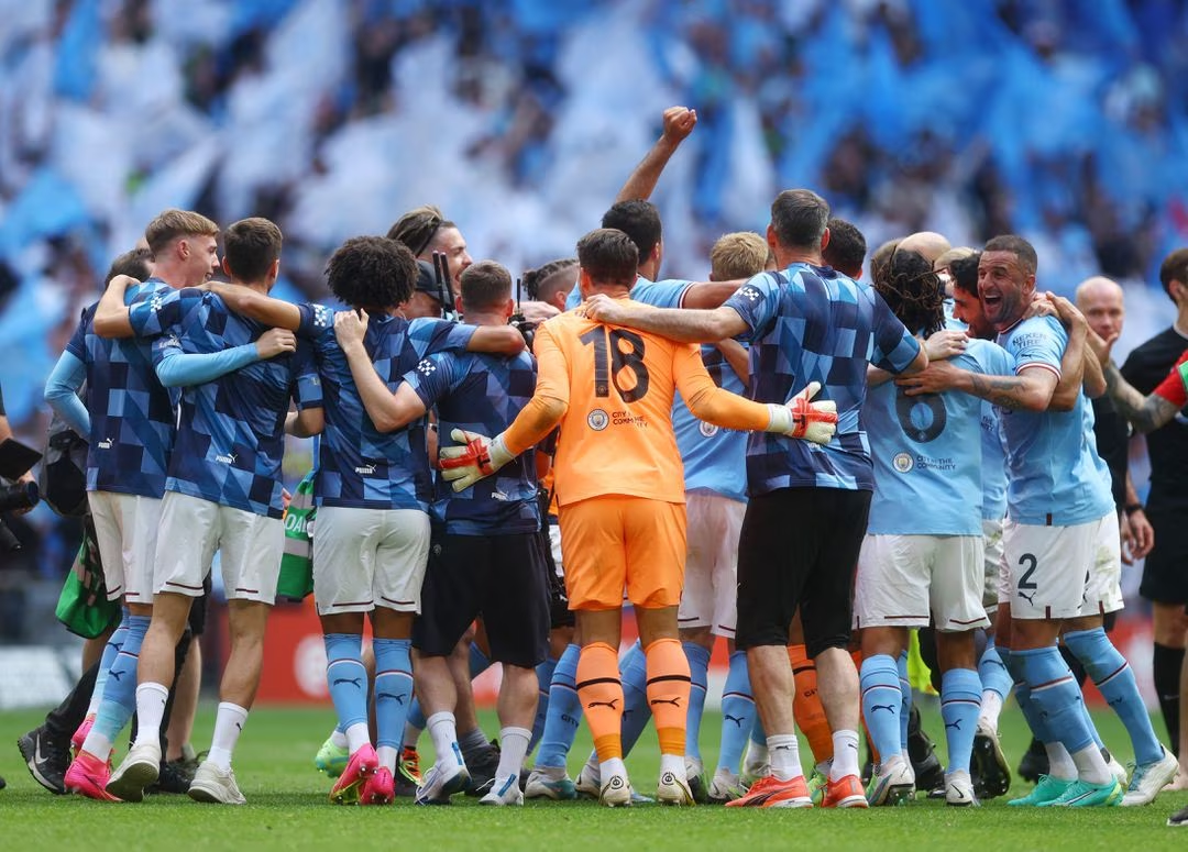 Man City edge closer to treble after FA Cup final win over Man Utd