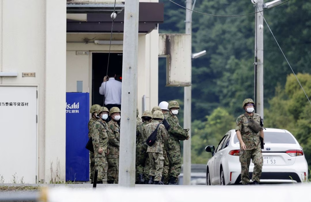 Japan Self Defence Force member arrested on suspicion of attempted murder after shooting, NHK